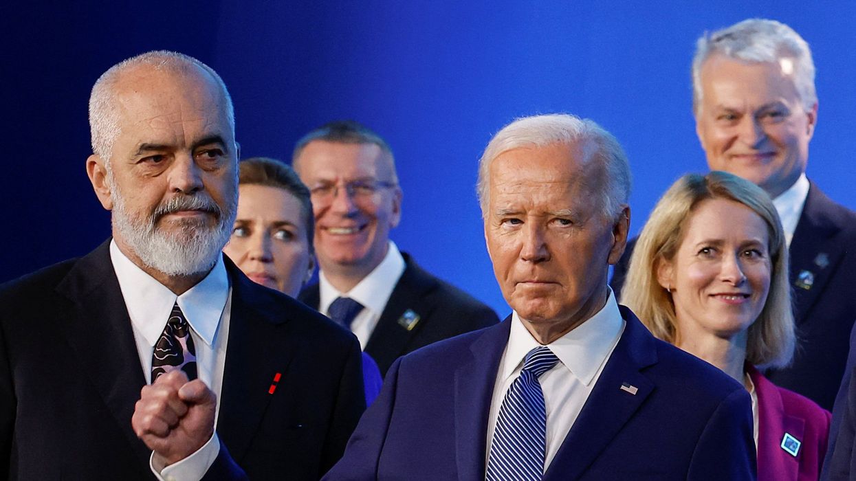 U.S. President Joe Biden gestures, as he and Estonia's Prime Minister Kaja Kallas, Lithuania's President Gitanas Nauseda and Albania's Prime Minister Edi Rama attend NATO's 75th anniversary summit in Washington, U.S., July 10, 2024.