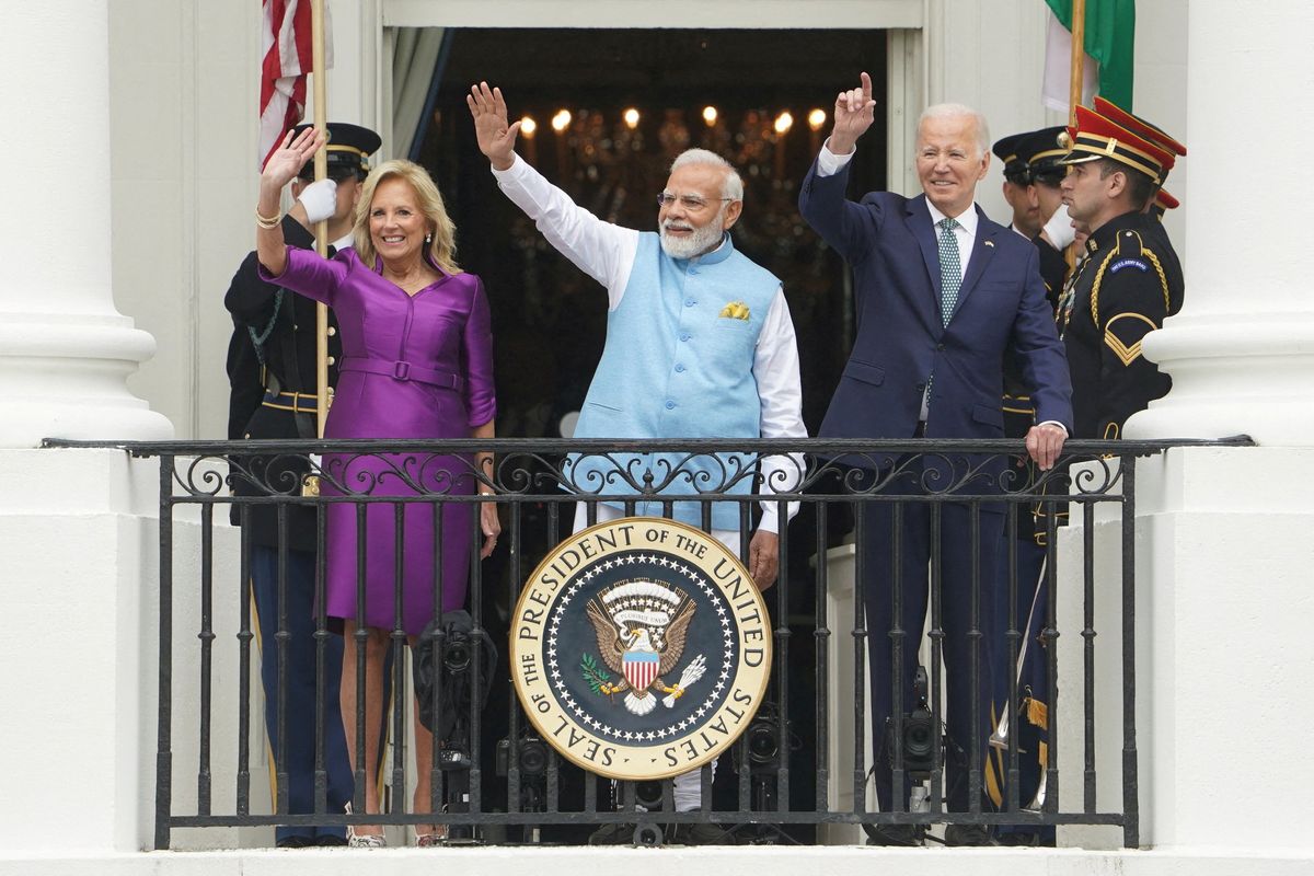 U.S. President Joe Biden, India's Prime Minister Narendra Modi and U.S. first lady Jill Biden wave during an official State Arrival Ceremony at the start of Modi's visit to the White House.