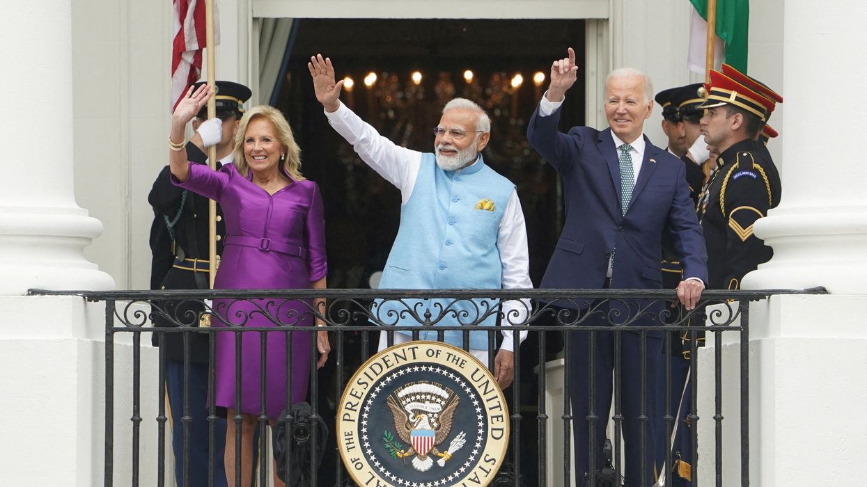 U.S. President Joe Biden, India's Prime Minister Narendra Modi and U.S. first lady Jill Biden wave during an official State Arrival Ceremony at the start of Modi's visit to the White House.