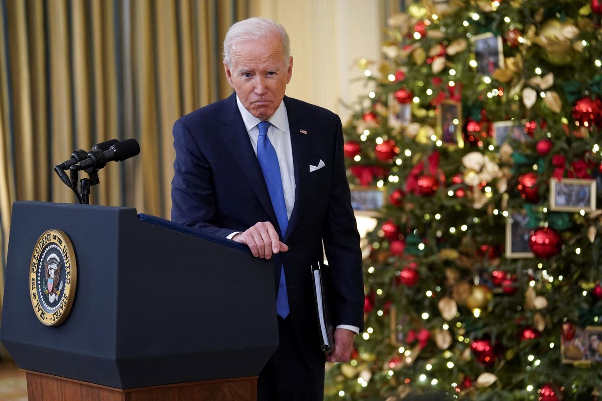 U.S. President Joe Biden listens to a question as he speaks about the country's fight against the coronavirus disease (COVID-19) at the White House in Washington, U.S., December 21, 2021