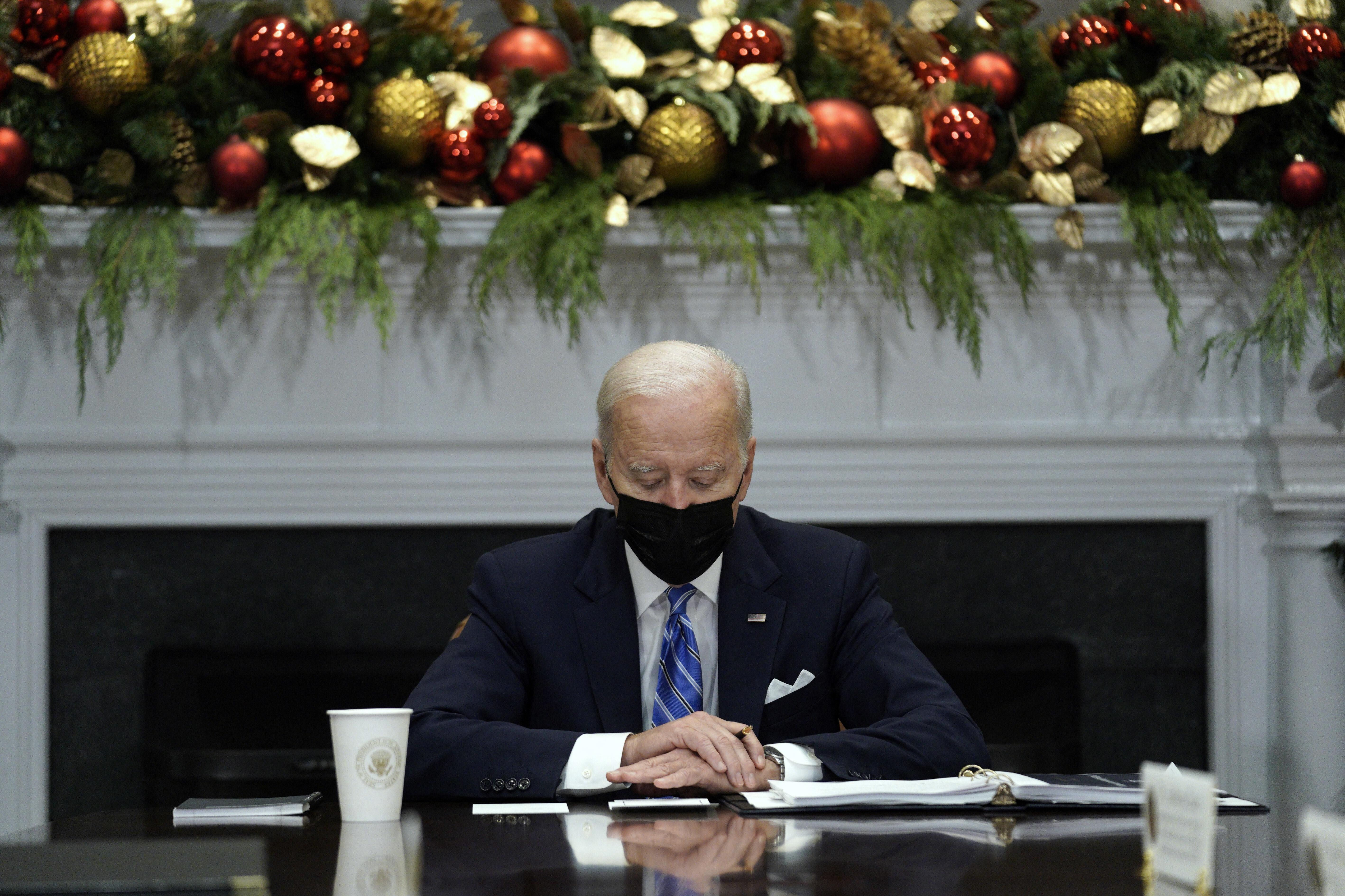 U.S. President Joe Biden meets with members of the White House COVID-19 Response Team on the latest developments related to the Omicron variant in the Roosevelt Room in the White House in Washington, U.S., December 16, 2021