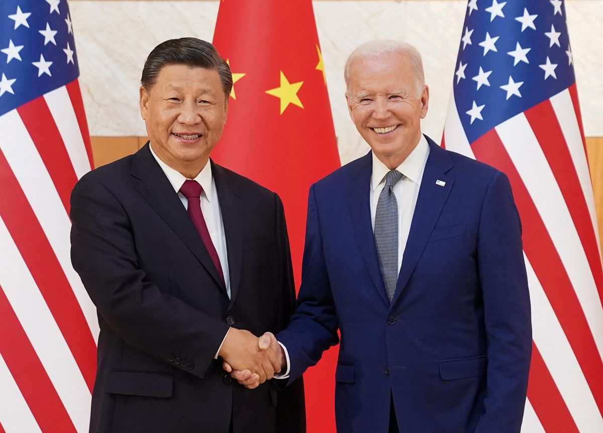 U.S. President Joe Biden shakes hands with Chinese President Xi Jinping as they meet on the sidelines of the G20 leaders' summit in Bali.