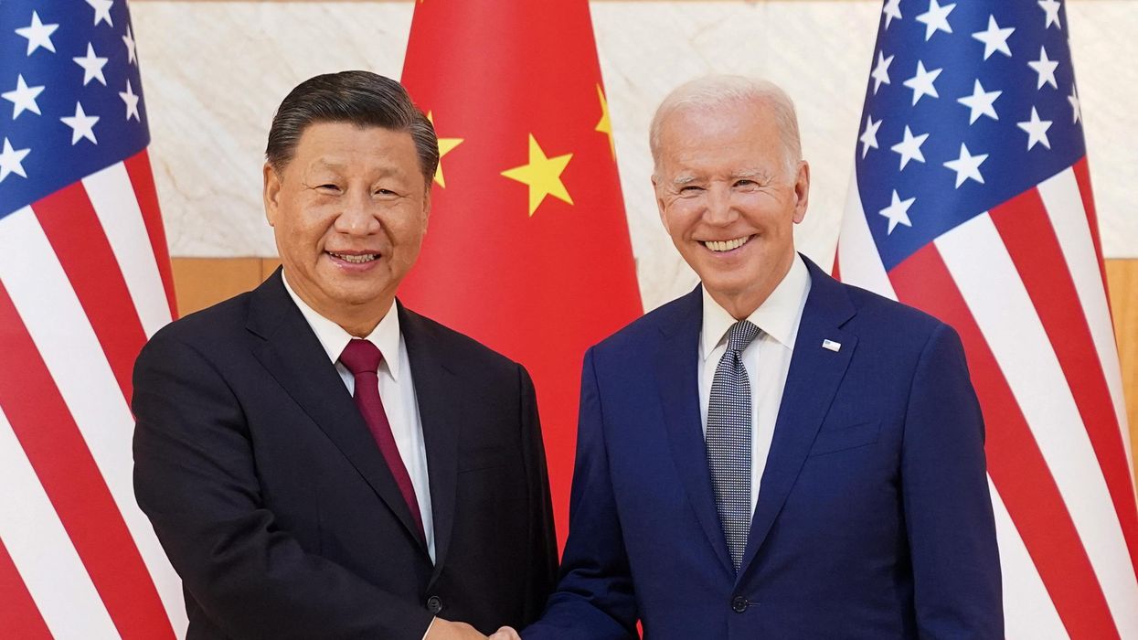 U.S. President Joe Biden shakes hands with Chinese President Xi Jinping as they meet on the sidelines of the G20 leaders' summit in Bali.