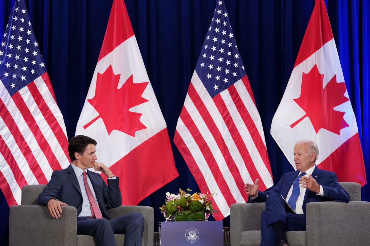 U.S. President Joe Biden speaks with Canada's Prime Minister Justin Trudeau as they meet during the Ninth Summit of the Americas in Los Angeles, California, U.S., June 9, 2022.
