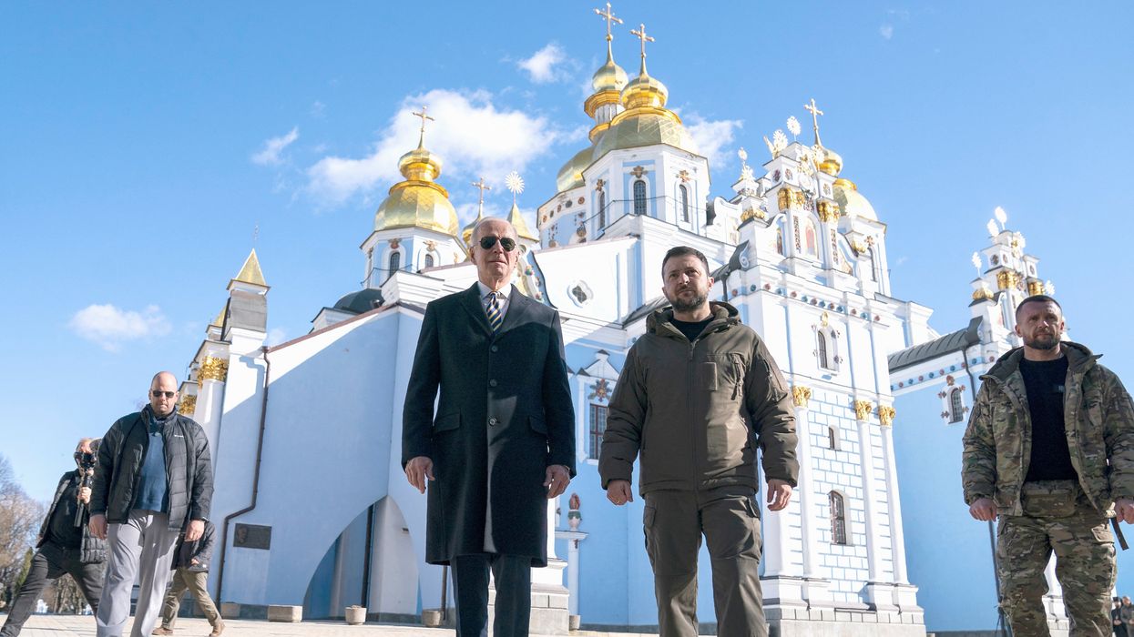 U.S. President Joe Biden walks with Ukrainian President Volodymyr Zelenskiy during an unannounced visit, in Kyiv, Ukraine.