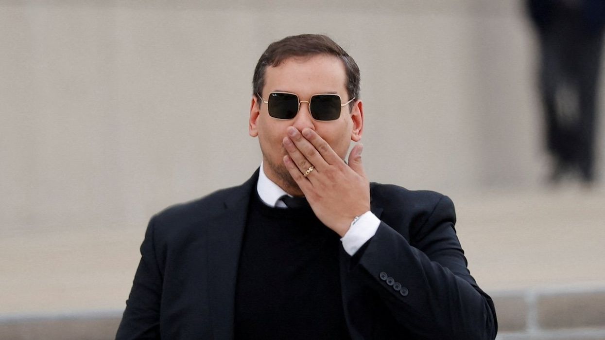U.S. Representative George Santos (R-NY) walks outside the Central Islip Federal Courthouse on the day of his hearing, in Central Islip, New York, U.S., October 27, 2023.