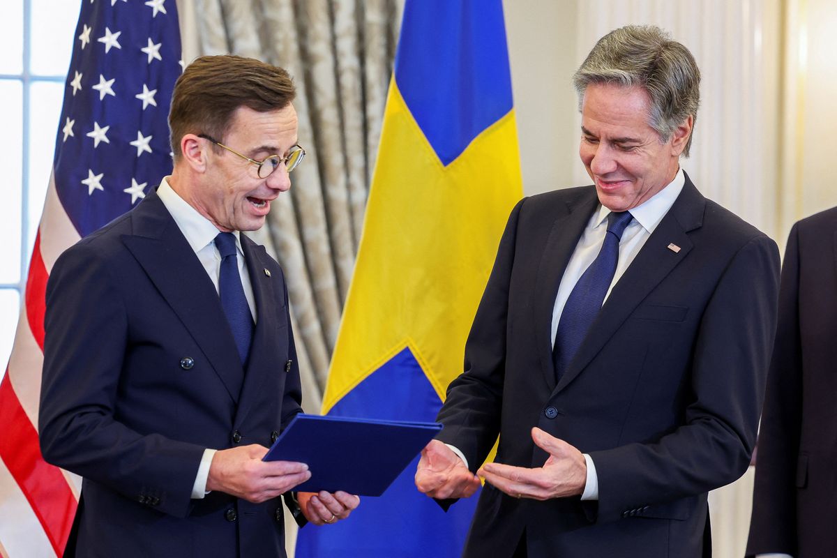 ​U.S. Secretary of State Antony Blinken accepts Sweden's instruments of accession from Swedish Prime Minister Ulf Kristersson for its entry into NATO at the State Department in Washington, U.S., March 7, 2024. 