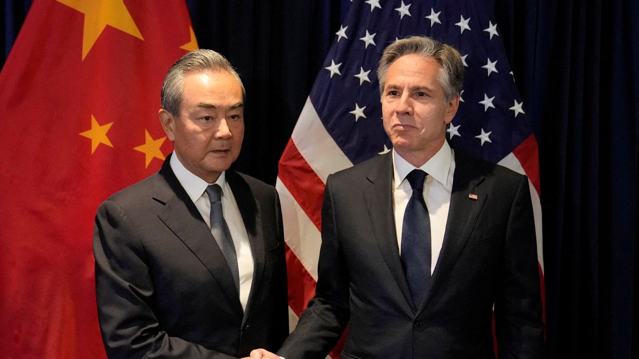 U.S. Secretary of State Antony Blinken shakes hands with Chinese Communist Party's foreign policy chief Wang Yi during their bilateral meeting on the sidelines of the Association of Southeast Asian Nations (ASEAN) Foreign Ministers' Meeting in Jakarta, Indonesia, Thursday, July 13, 2023.