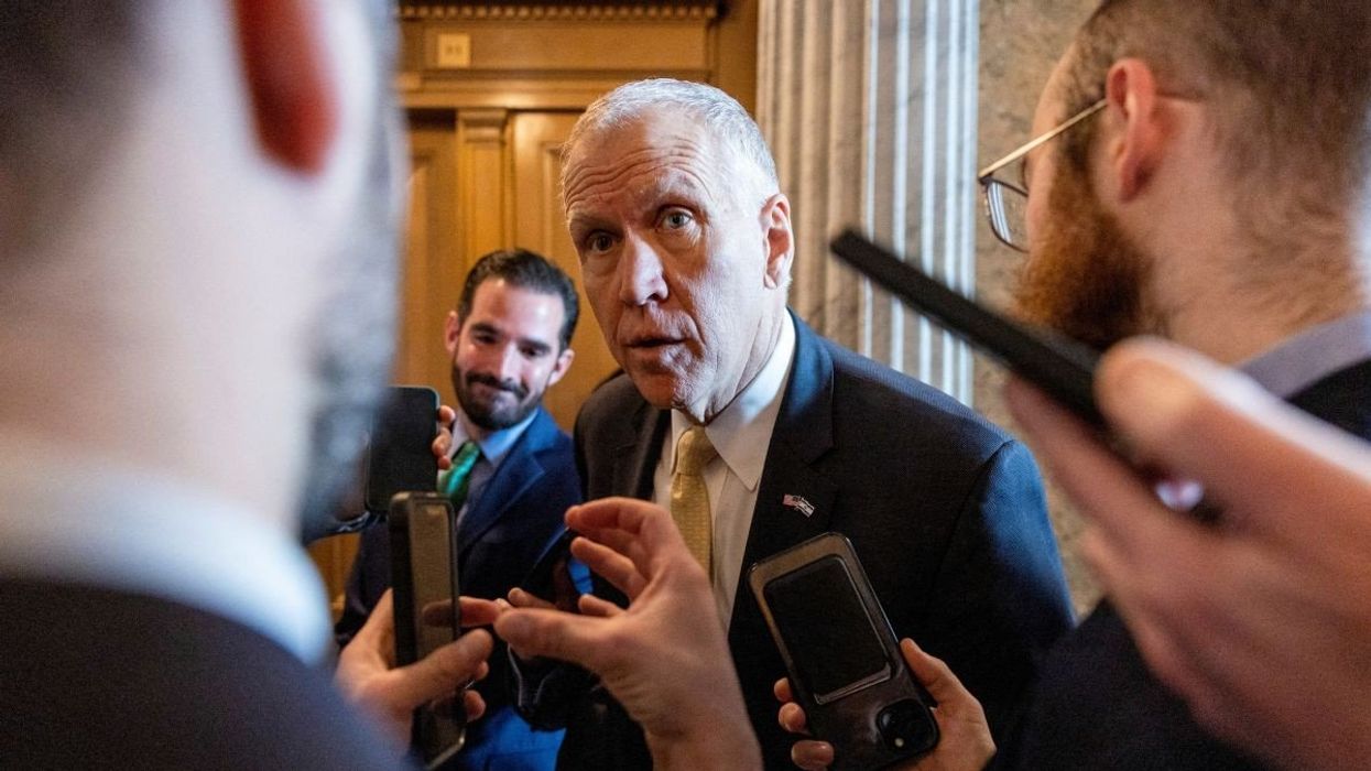 U.S. Senator Thom Tillis (R-NC) speaks to reporters between votes at the U.S. Capitol building in Washington, U.S., January 23, 2024/