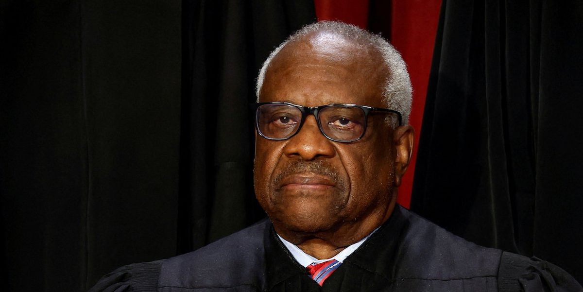 U.S. Supreme Court Associate Justice Clarence Thomas poses during a group portrait at the Supreme Court in Washington, U.S., October 7, 2022. 