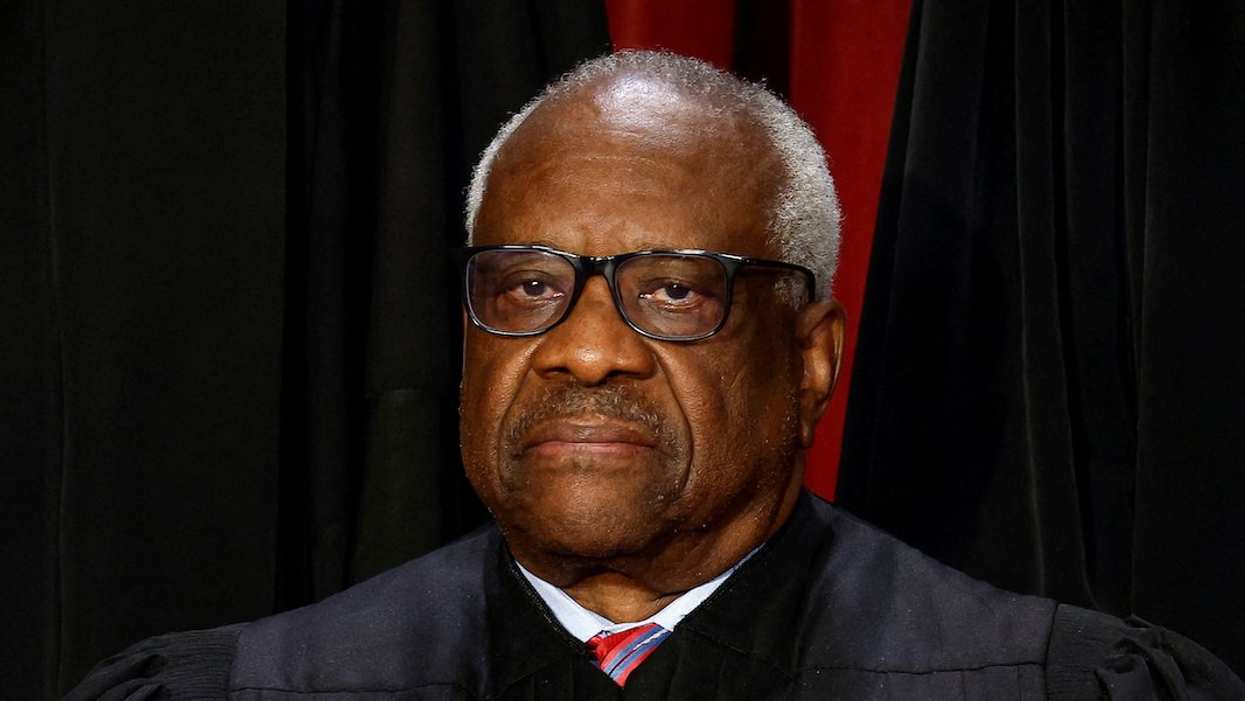 U.S. Supreme Court Associate Justice Clarence Thomas poses during a group portrait at the Supreme Court in Washington, U.S., October 7, 2022.