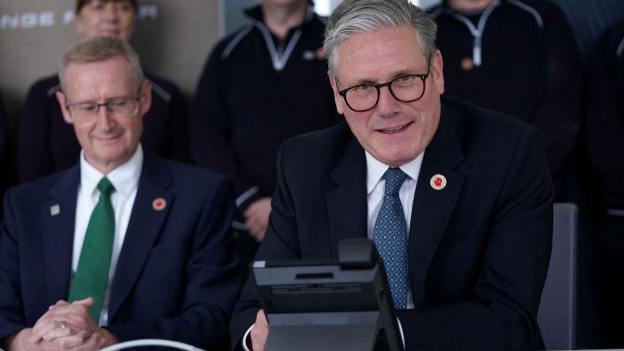 UK Prime Minister Keir Starmer speaks on the phone to US President Donald Trump at a car factory in the West Midlands, United Kingdom, on May 8, 2025.