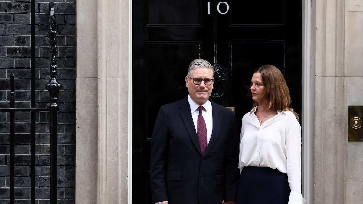 UK Prime Minister Keir Starmer stands with his wife Victoria Starmer after announcing the timeline for his resignation, outside 10 Downing Street, in London, United Kingdom, on June 22, 2026.
