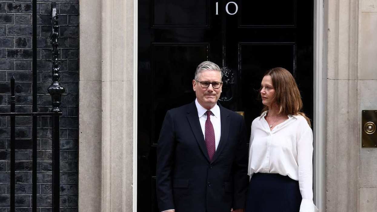 UK Prime Minister Keir Starmer stands with his wife Victoria Starmer after announcing the timeline for his resignation, outside 10 Downing Street, in London, United Kingdom, on June 22, 2026.