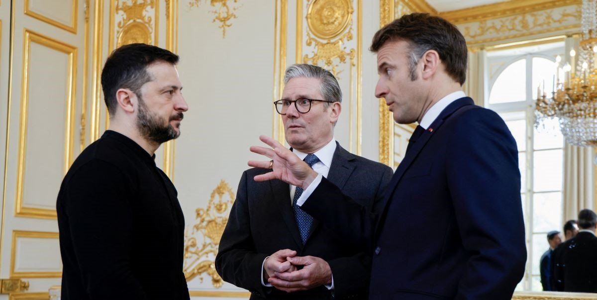 Ukraine's President Volodymyr Zelenskiy, France's President Emmanuel Macron and Britain's Prime Minister Keir Starmer speak during a trilateral meeting on the sidelines of a summit for "Coalition of the Willing" at Elysee Palace in Paris, France March 27, 2025.