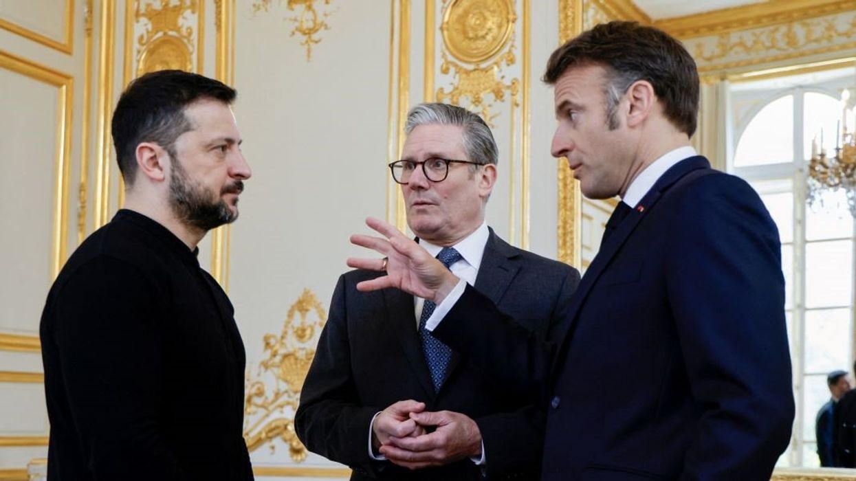 Ukraine's President Volodymyr Zelenskiy, France's President Emmanuel Macron and Britain's Prime Minister Keir Starmer speak during a trilateral meeting on the sidelines of a summit for "Coalition of the Willing" at Elysee Palace in Paris, France March 27, 2025.