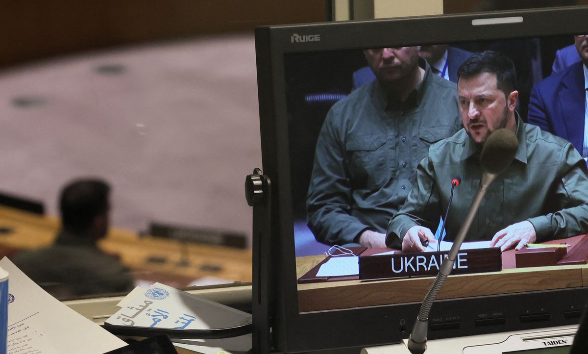 Ukraine's President Volodymyr Zelenskiy is seen on a video monitor in a booth above the United Nations Security Council floor.
