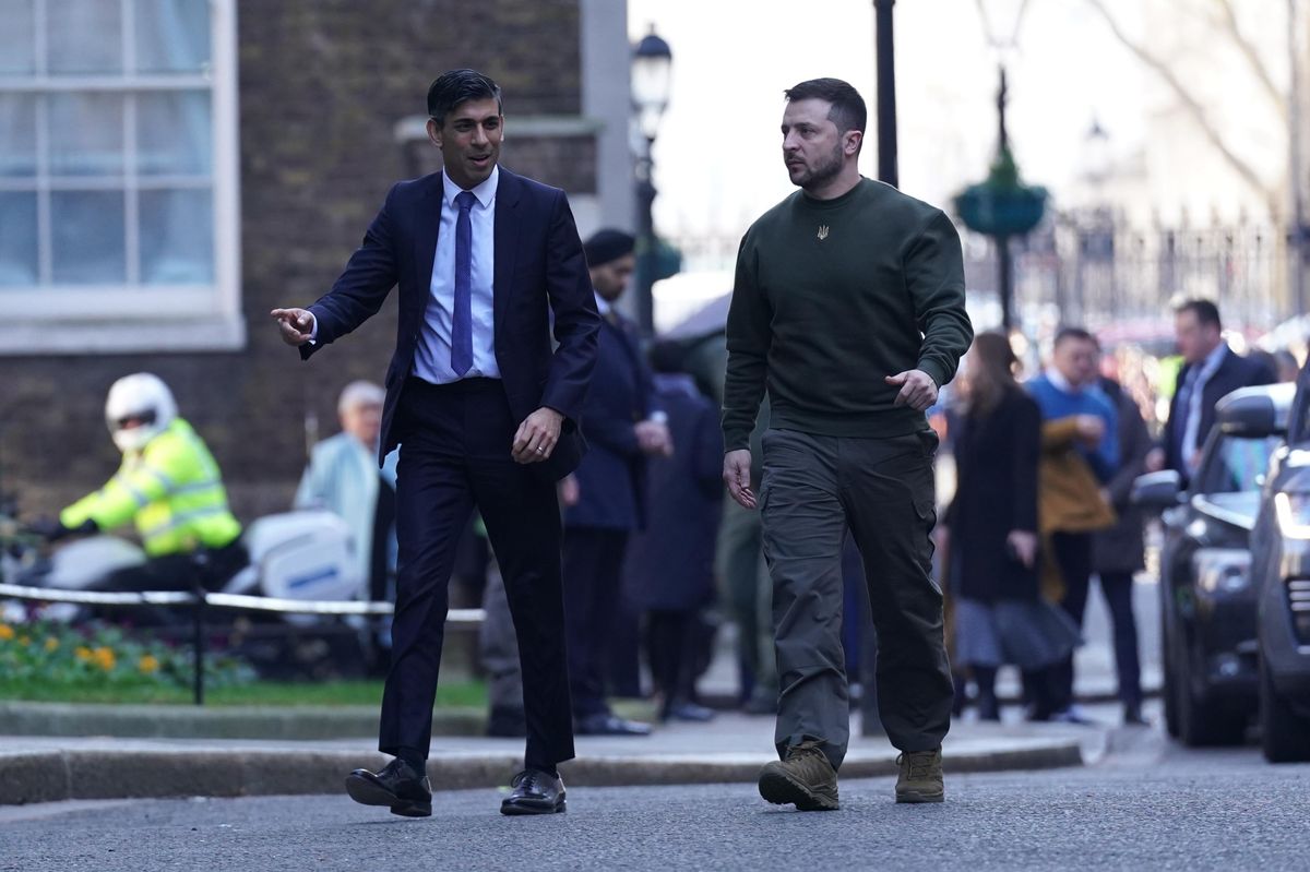 Ukraine's President Volodymyr Zelensky walks outside No. 10 Downing Street in London, ahead of a bilateral meeting with British PM Rishi Sunak.