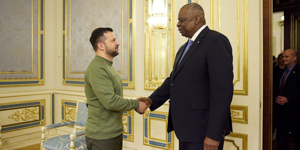 Ukraine's President Volodymyr Zelensky welcomes U.S. Defense Secretary Lloyd Austin before their meeting, amid Russia's attack on Ukraine, in Kyiv, Ukraine November 20, 2023. 