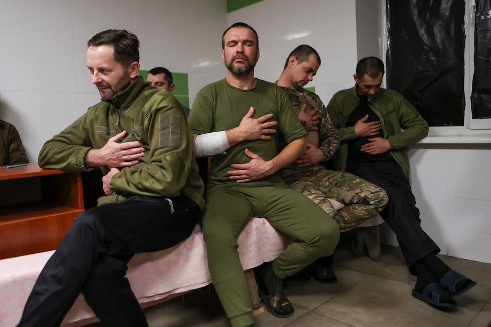 Ukrainian service members attend a stress control session at a military medical centre, amid Russia's attack on Ukraine, in Donetsk region, Ukraine November 17, 2023.