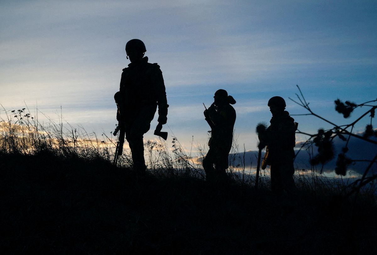 Ukrainian soldiers take positions at the military airbase Vasylkiv in the Kyiv region