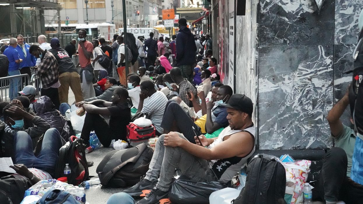 Undocumented Immigrants from West Africa, Mexico, and Venezuela camp outside the Roosevelt Hotel in New York City.