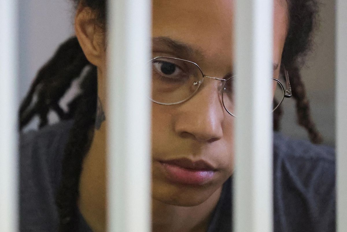 US basketball player Brittney Griner sits inside a defendants' cage before the court's verdict in Khimki outside Moscow, Russia.