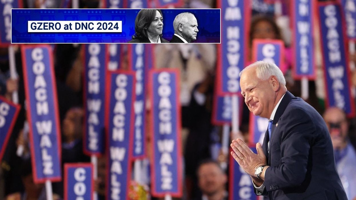 US Democratic vice presidential nominee Minnesota Gov. Tim Walz takes the stage on Day 3 of the Democratic National Convention in Chicago, Illinois, on Aug. 21, 2024.