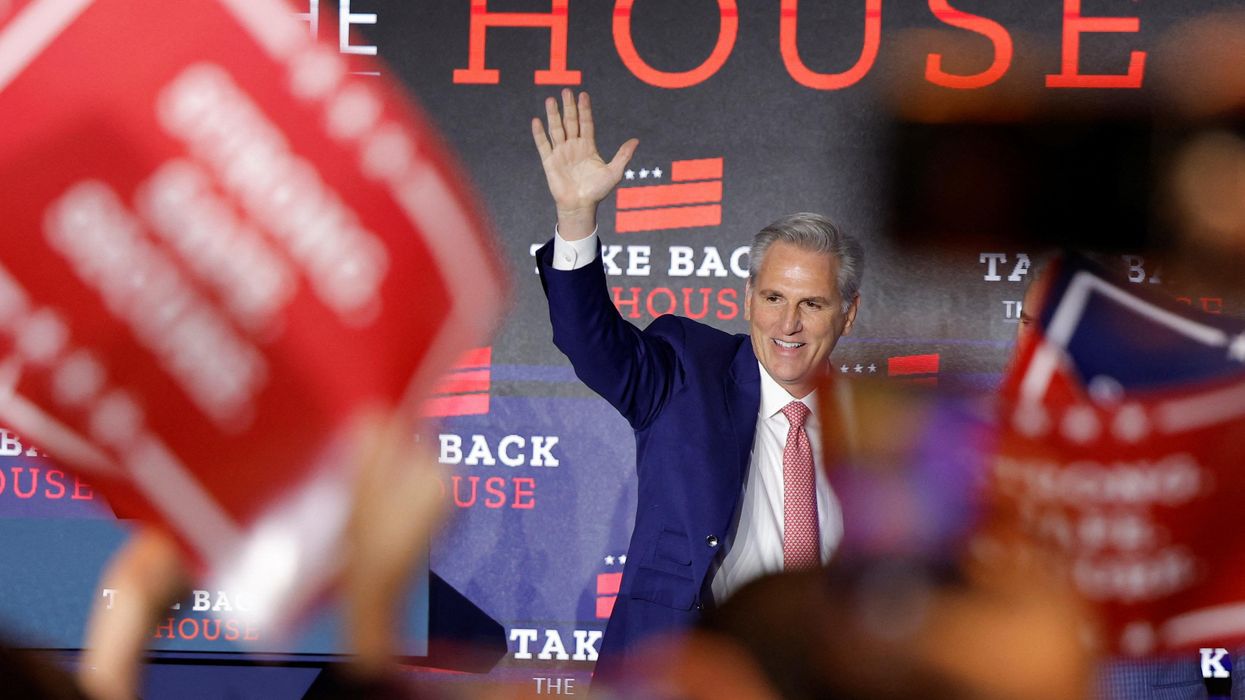 US House Republican Leader Kevin McCarthy (R-CA) waves after speaking to supporters on midterms election night.