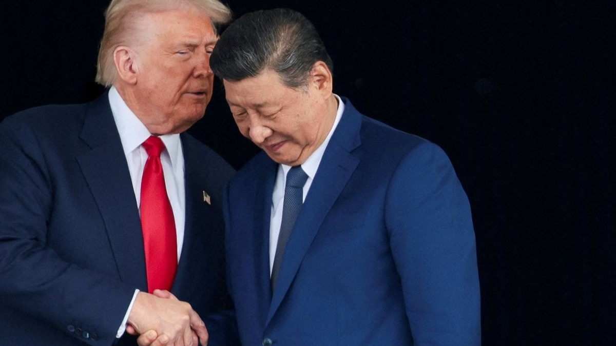 US President Donald Trump and Chinese President Xi Jinping talk in Busan, South Korea, on October 30, 2025.