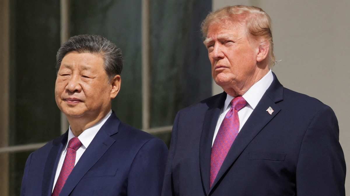 US President Donald Trump and Chinese President Xi Jinping watch a military demonstration from a balcony of the White House in Washington, D.C.