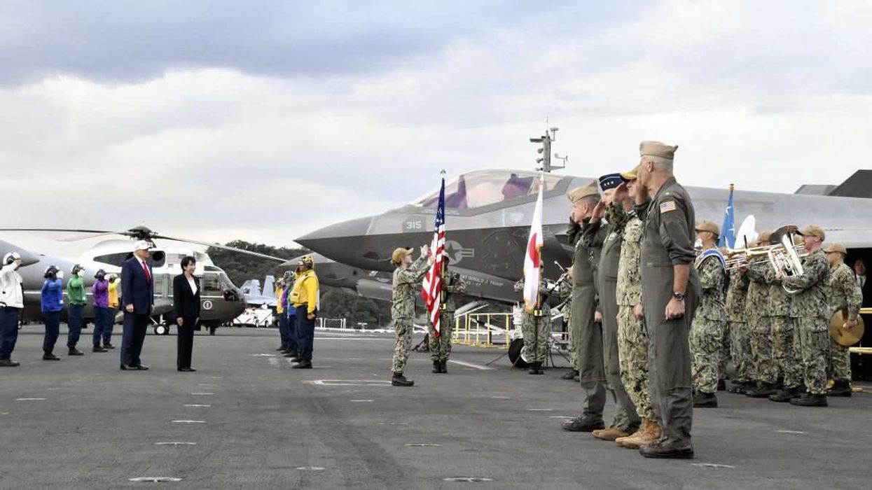 US President Donald Trump and Japanese Prime Minister Sanae Takaichi arrive at the nuclear-powered aircraft carrier USS George Washington (CVN-73) in Yokosuka City, Kanagawa Prefecture, Japan, on October 28, 2025.
