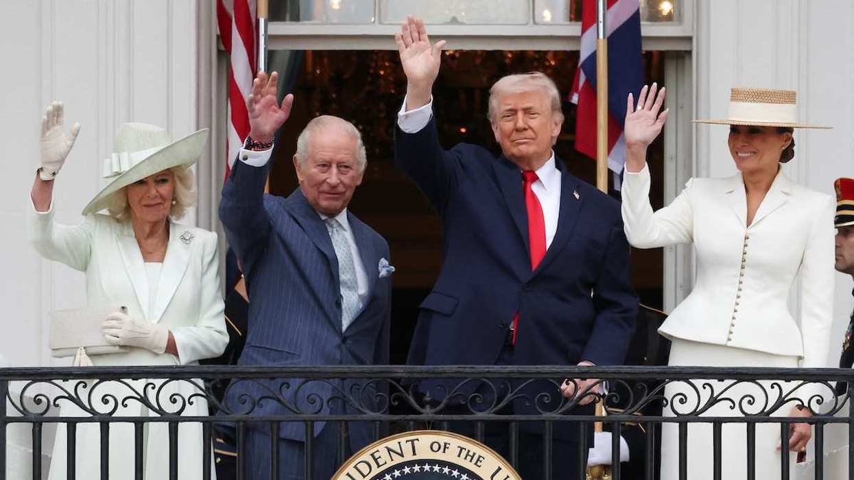 US President Donald Trump, first lady Melania Trump, King Charles III and Queen Camilla wave from the balcony of the White House, in Washington, D.C., USA, on April 28, 2026.