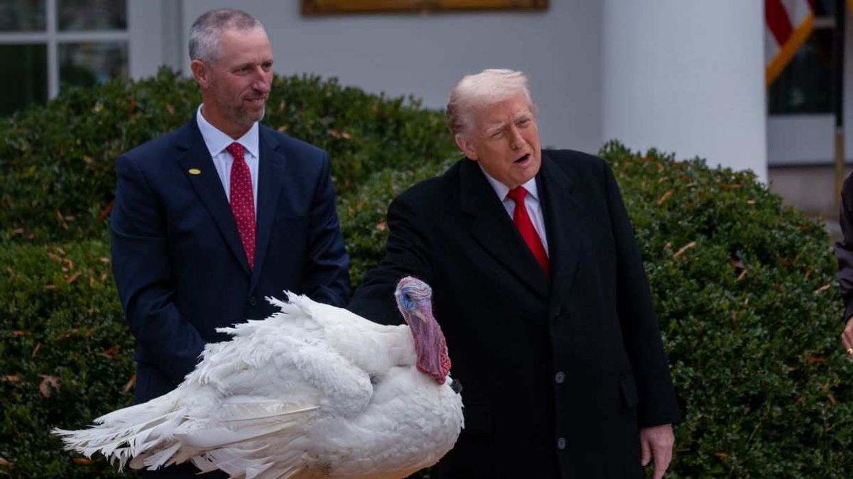 US President Donald Trump pardons a turkey in Washington, D.C., USA, on Nov. 25, 2025.