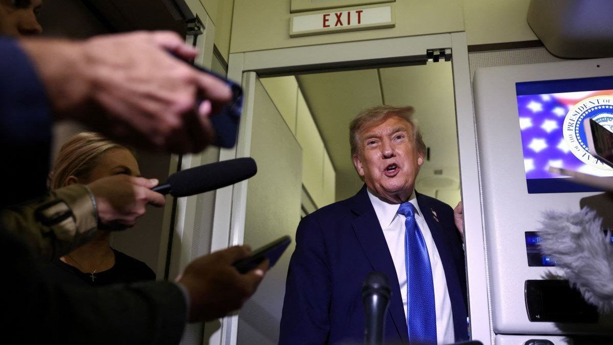 ​US President Donald Trump speaks to reporters aboard Air Force One on June 17, 2025.