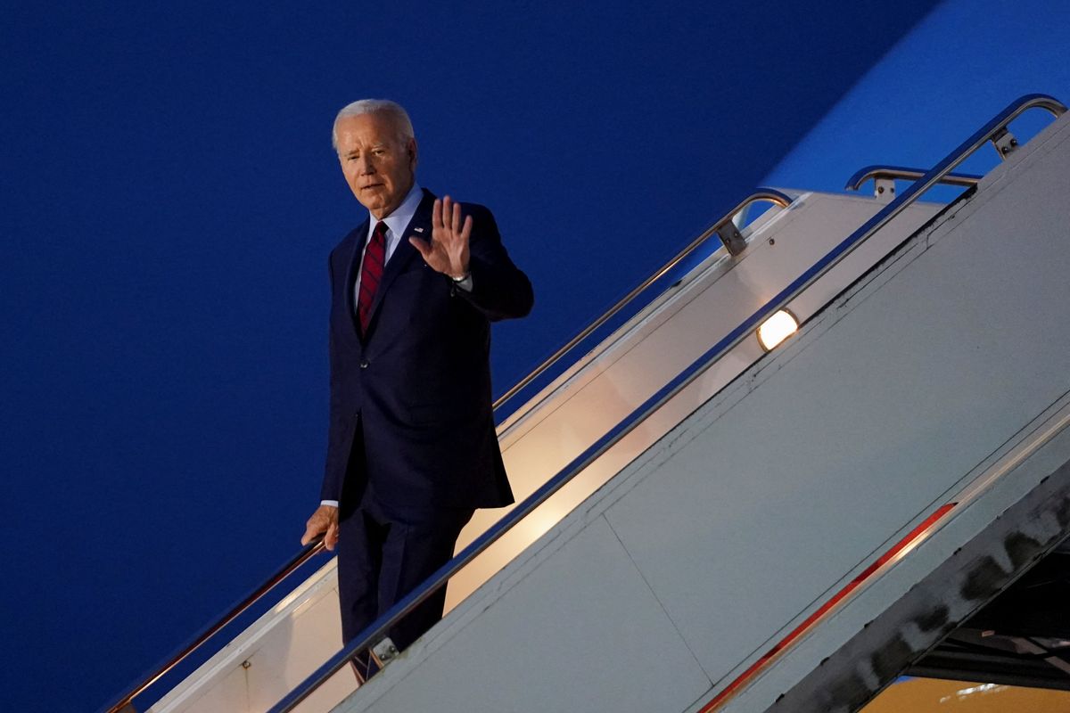 US President Joe Biden disembarks Air Force One as he visits Stansted Airport in the UK.