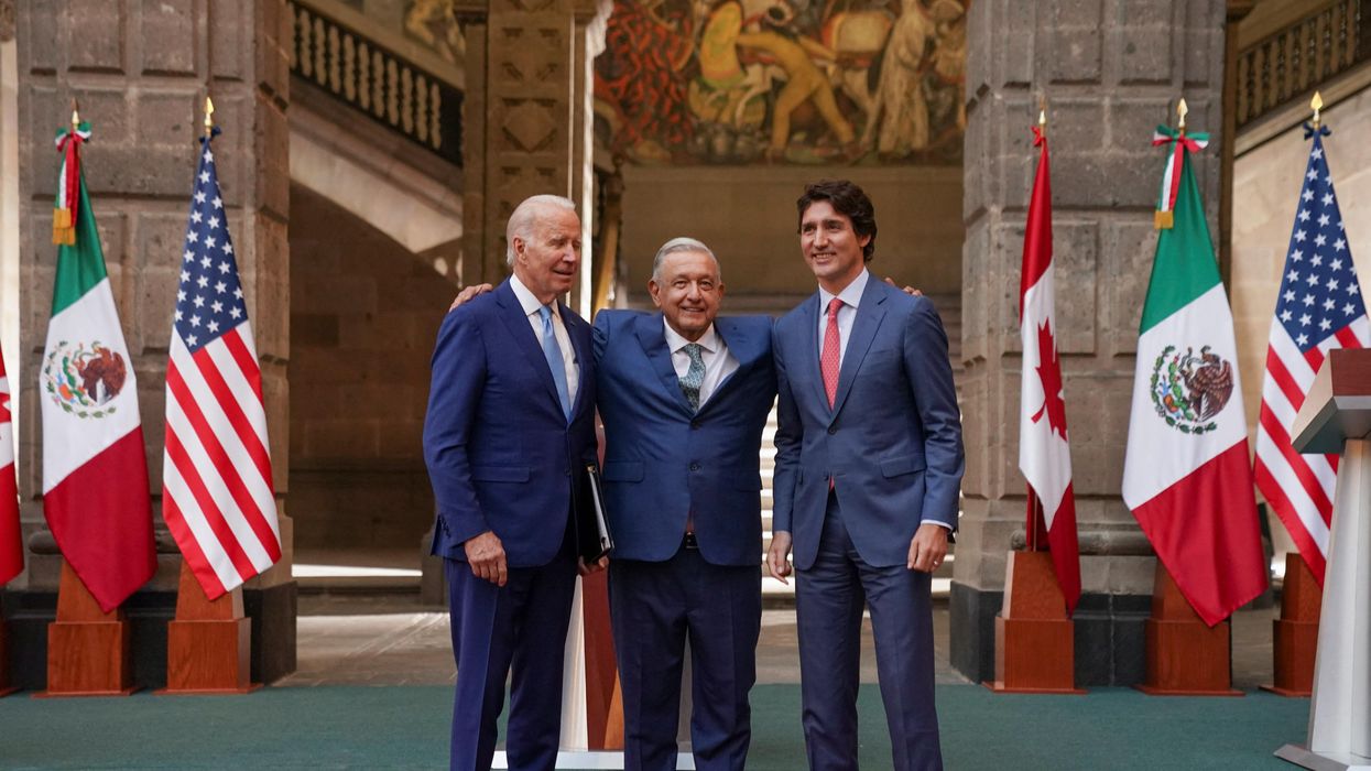 US President Joe Biden, Mexican President AMLO and Canadian PM Justin Trudeau arrive for a joint news conference at the conclusion of the North American Leaders' Summit in Mexico City.