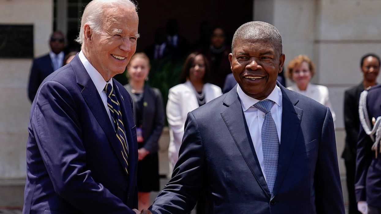 US President Joe Biden shakes hands with Angolan President João Lourenço at the Presidential Palace in Luanda, Angola, on Dec. 3, 2024.