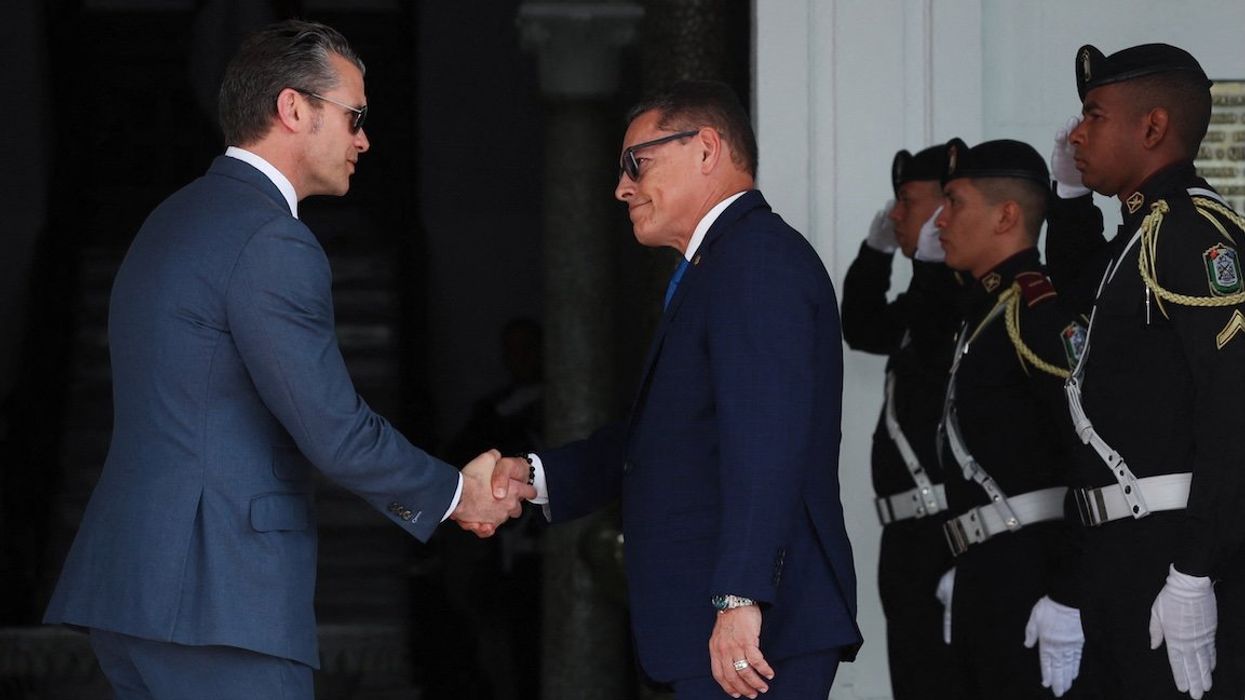 US Secretary of Defense Pete Hegseth and Panama's Minister of Public Security Frank Abrego shake hands n Panama City, Panama, on April 8, 2025.