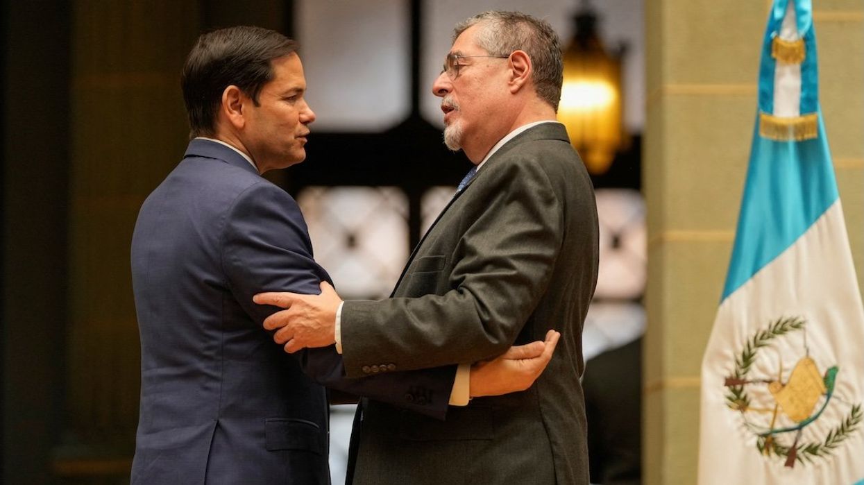 US Secretary of State Marco Rubio embraces Guatemalan President Bernardo Arevalo at the end of their joint news conference at the National Palace in Guatemala City, on Feb. 5, 2025.