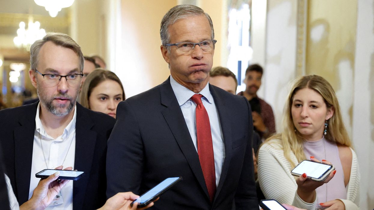 US Sen. John Thune (R-SD) talks to reporters about wrangling over the upcoming vote on debt ceiling legislation to avoid a historic default at the US Capitol in Washington, DC.