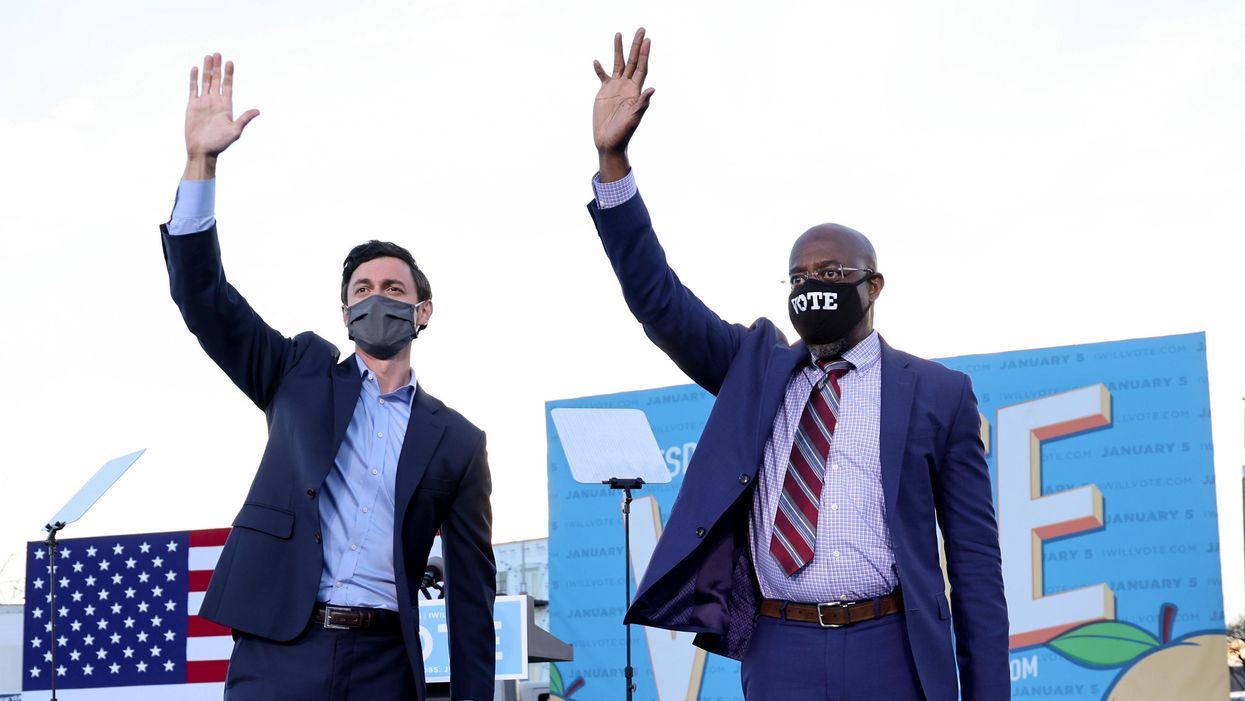 US senators-elect Jon Ossoff and Raphael Warnock campaign at a rally ahead of runoff elections in Atlanta, Georgia. Reuters