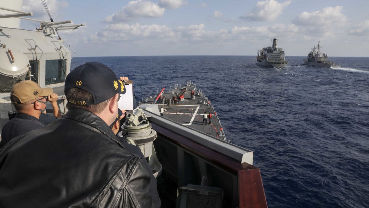 US ships during an underway replenishment in the Philippine Sea. January 19, 2023.