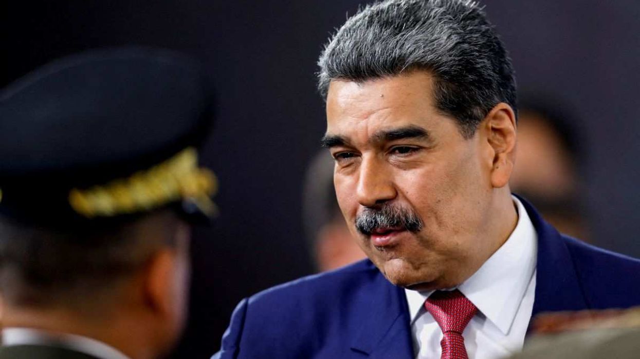 Venezuela's President Nicolas Maduro prepares to leave at the end of a press conference, days after he said Venezuela would deploy military, police and civilian defenses at 284 "battlefront" locations across the country, amid heightened tensions with the U.S., in Caracas, Venezuela, September 15, 2025.