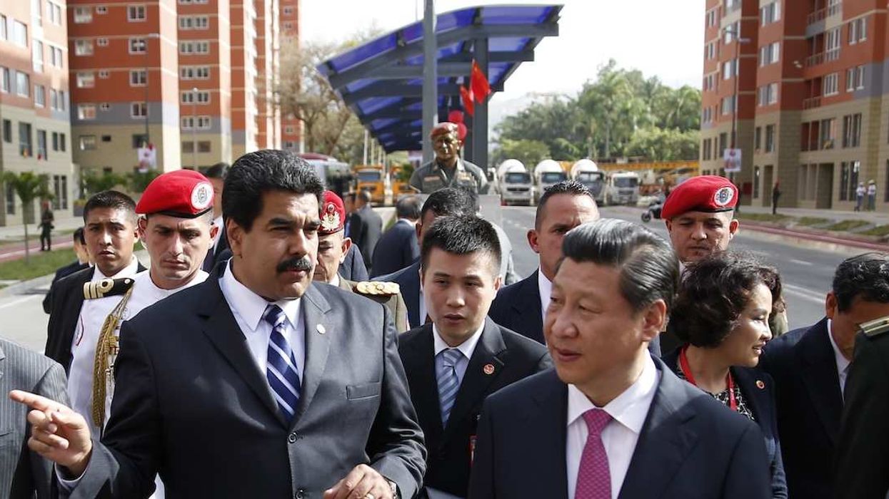 Venezuela's President Nicolas Maduro speaks with China's President Xi Jinping.