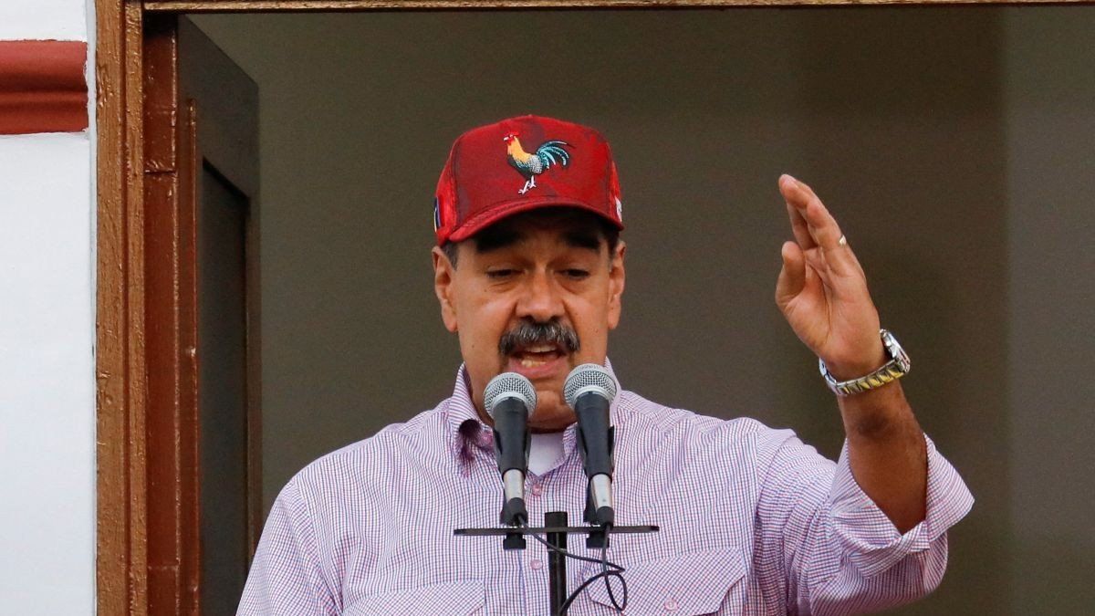 ​Venezuelan President Nicolas Maduro addresses supporters during a march marking the first anniversary of his victory in the disputed July 28 presidential election, in Caracas, Venezuela July 28, 2025. 