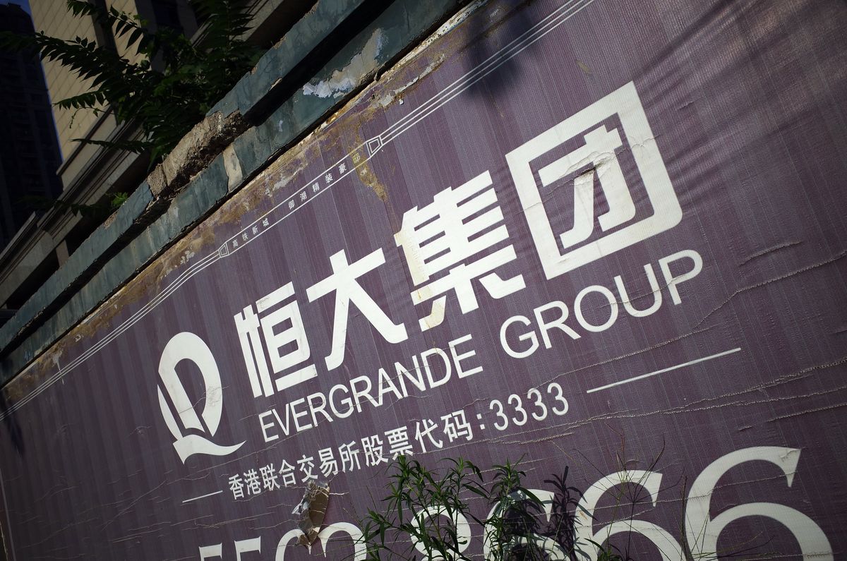 View of a signboard of Evergrande Group in Ji'nan city, east China's Shandong province.