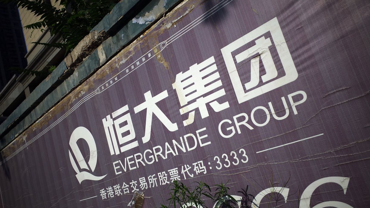 View of a signboard of Evergrande Group in Ji'nan city, east China's Shandong province.