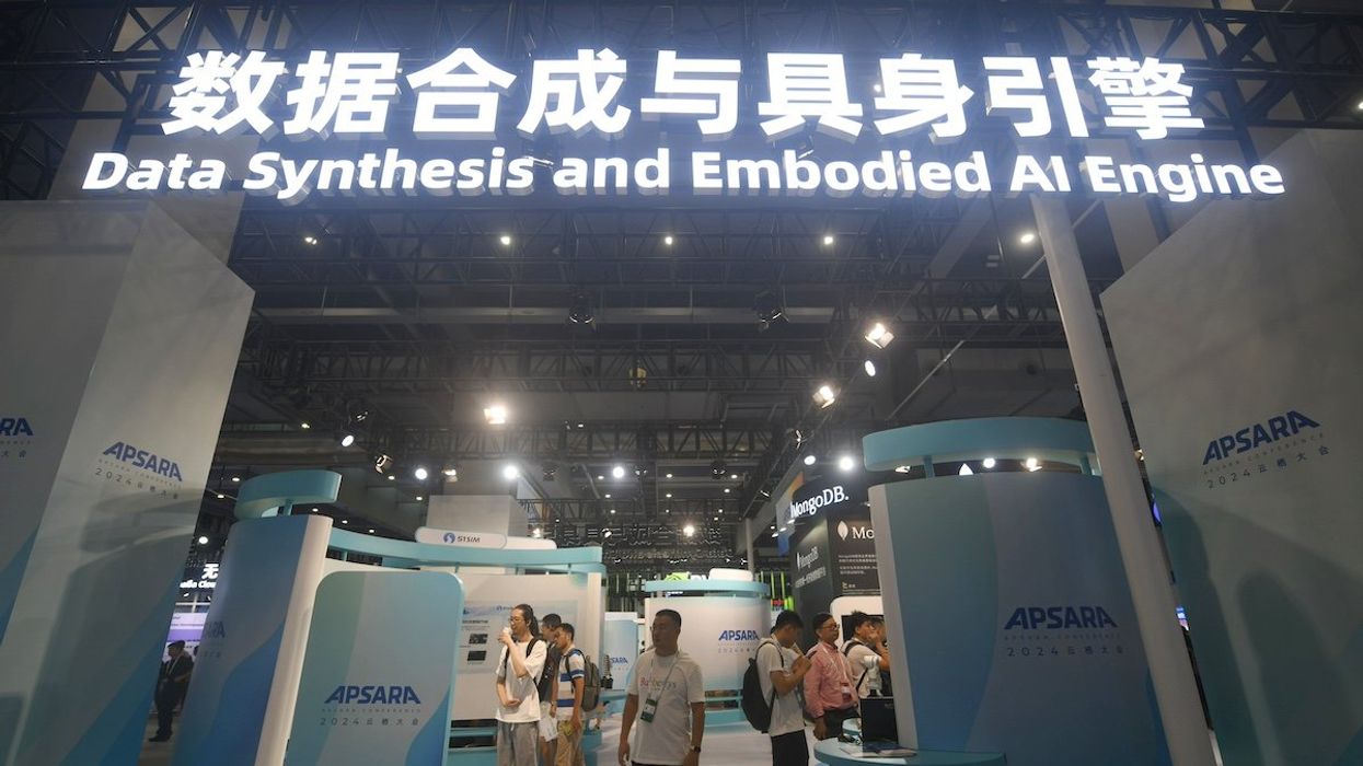 Visitors check out Alibaba Cloud's data synthesis and Embodied engine at the 2024 Apsara Conference in Hangzhou, China, on September 19, 2024.