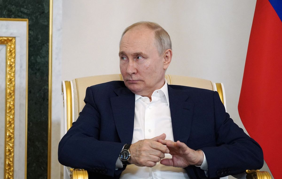 Vladimir Putin, hands crossed